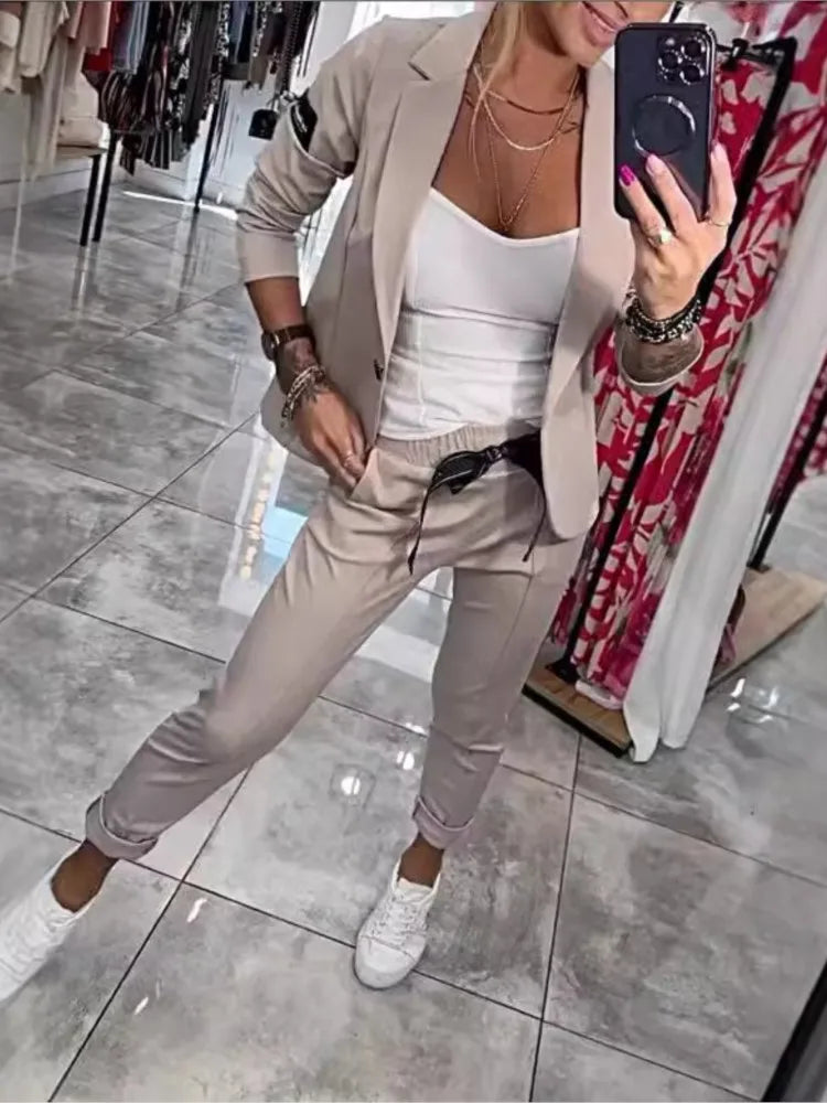 Zestaw damski: sweter zapinany na guziki i spodnie