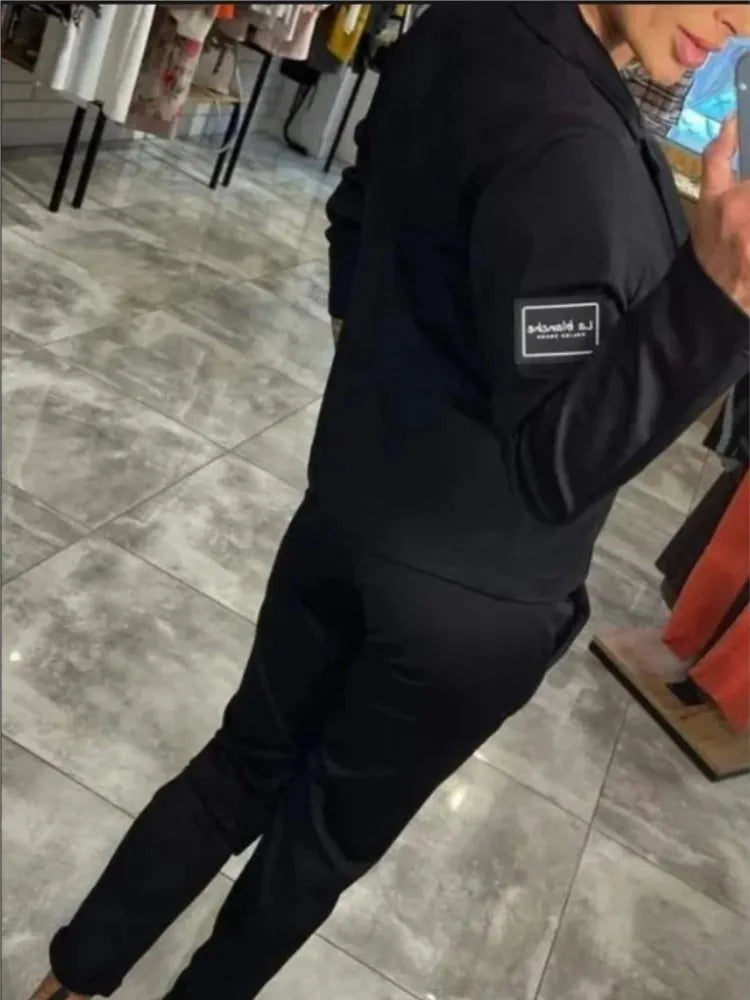 Zestaw damski: sweter zapinany na guziki i spodnie