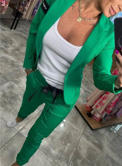 Zestaw damski: sweter zapinany na guziki i spodnie