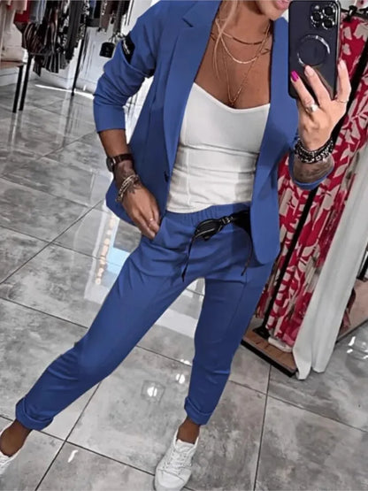 Zestaw damski: sweter zapinany na guziki i spodnie