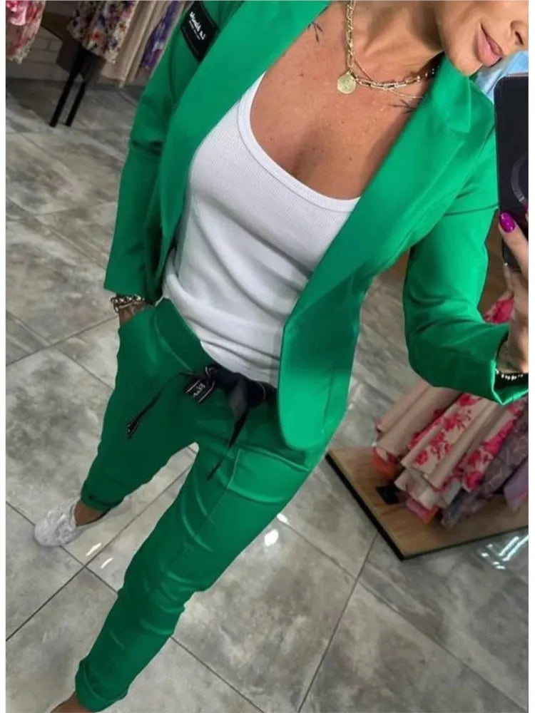 Zestaw damski: sweter zapinany na guziki i spodnie