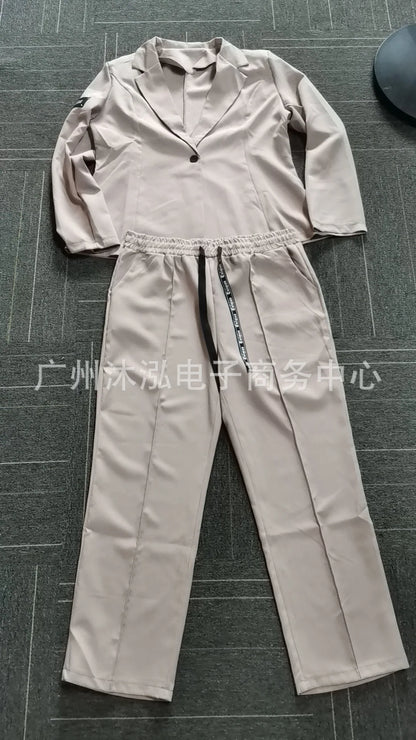 Zestaw damski: sweter zapinany na guziki i spodnie